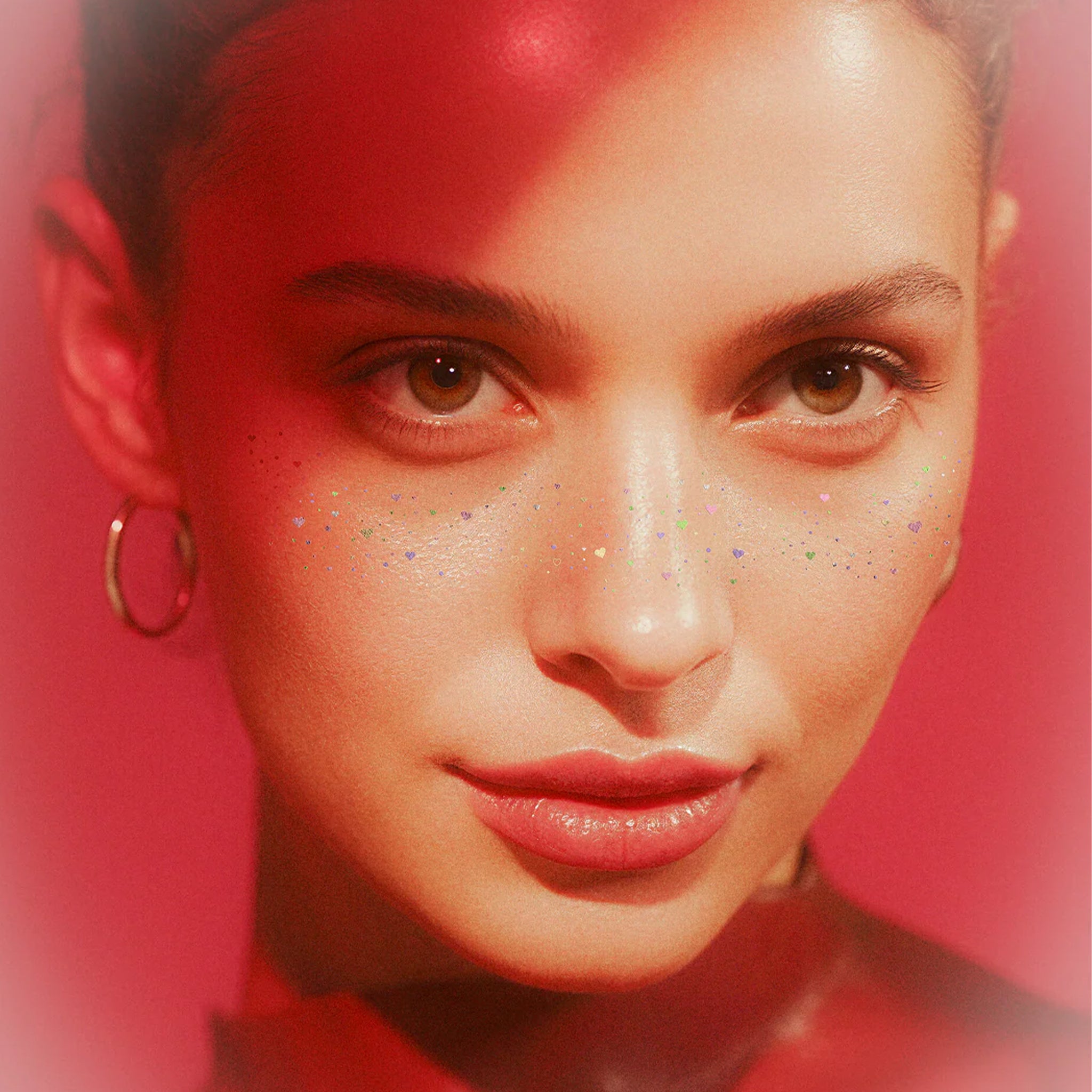 A set of sparkle heart shaped freckle makeup patches. 