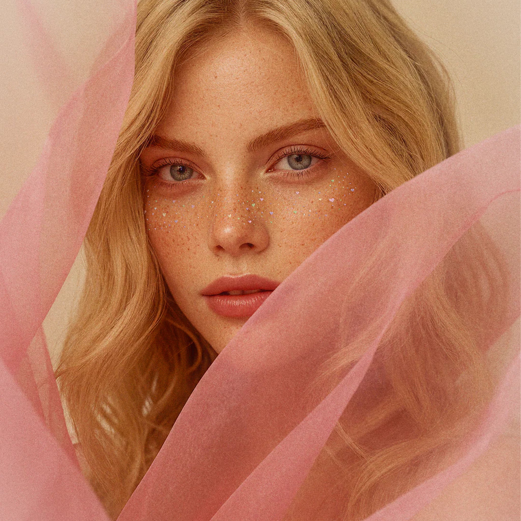 A set of sparkle heart shaped freckle makeup patches. 