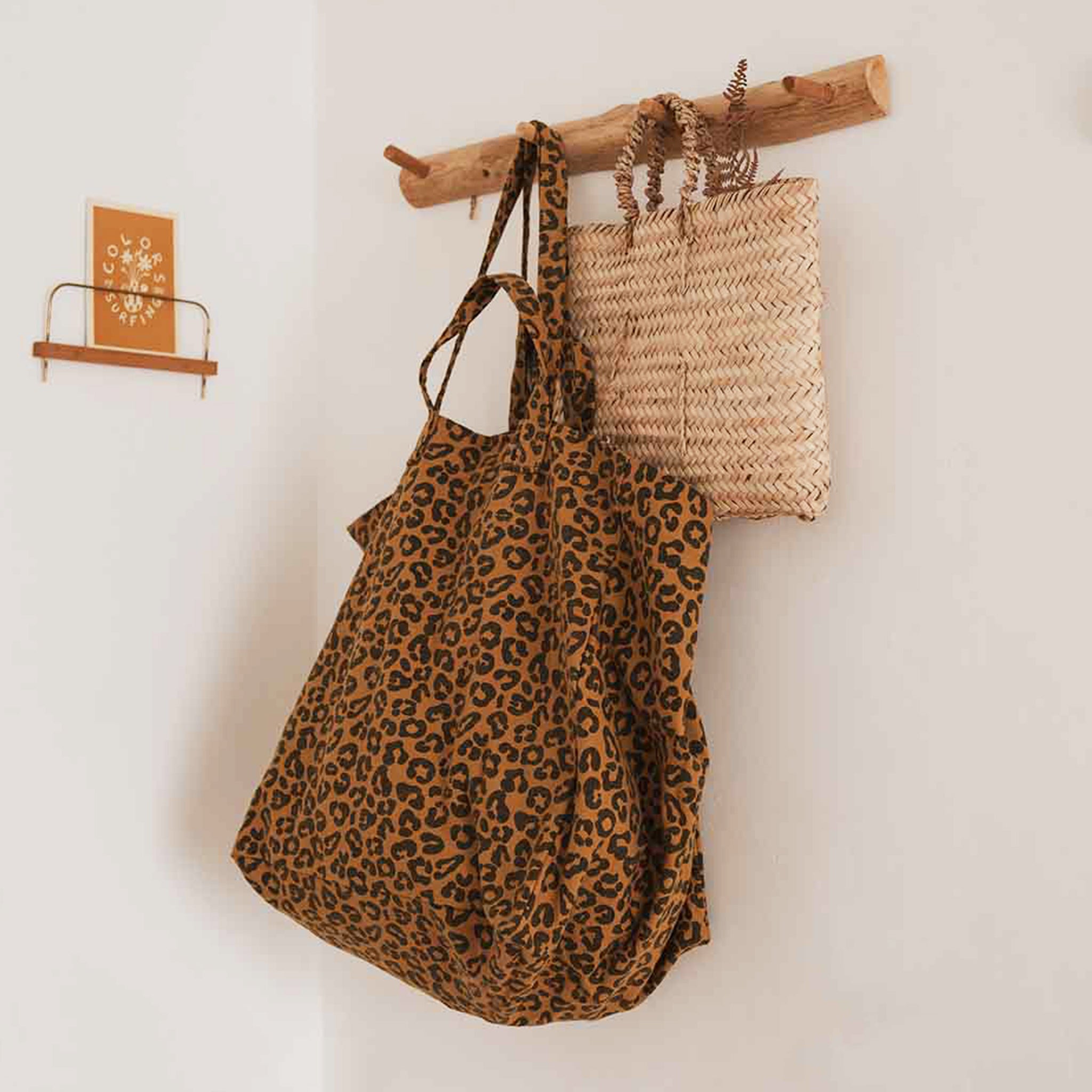 A leopard print canvas tote bag. 