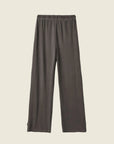 A pair of washed black lounge pants with a drawstring. 