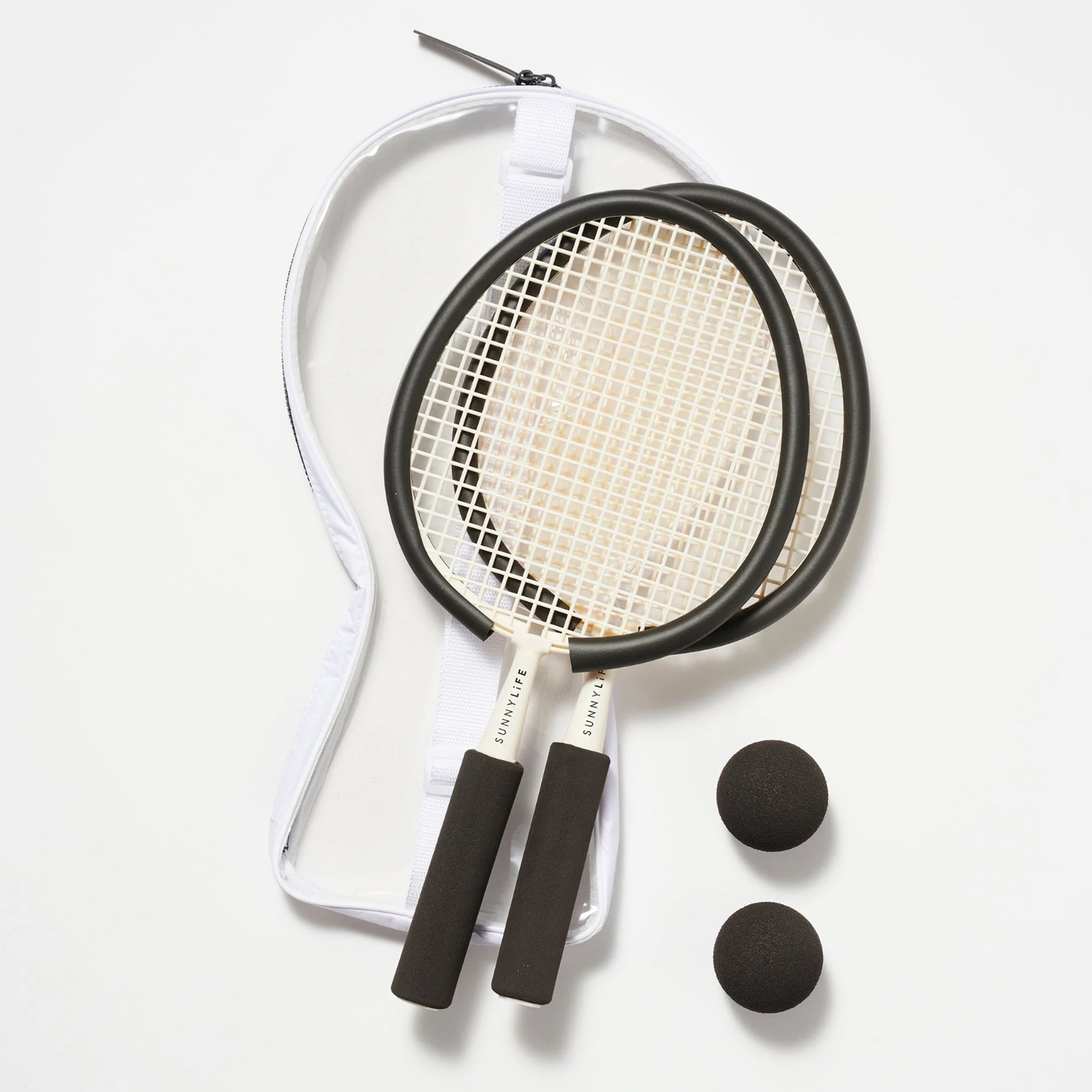 On a white background is two rackets with two balls.