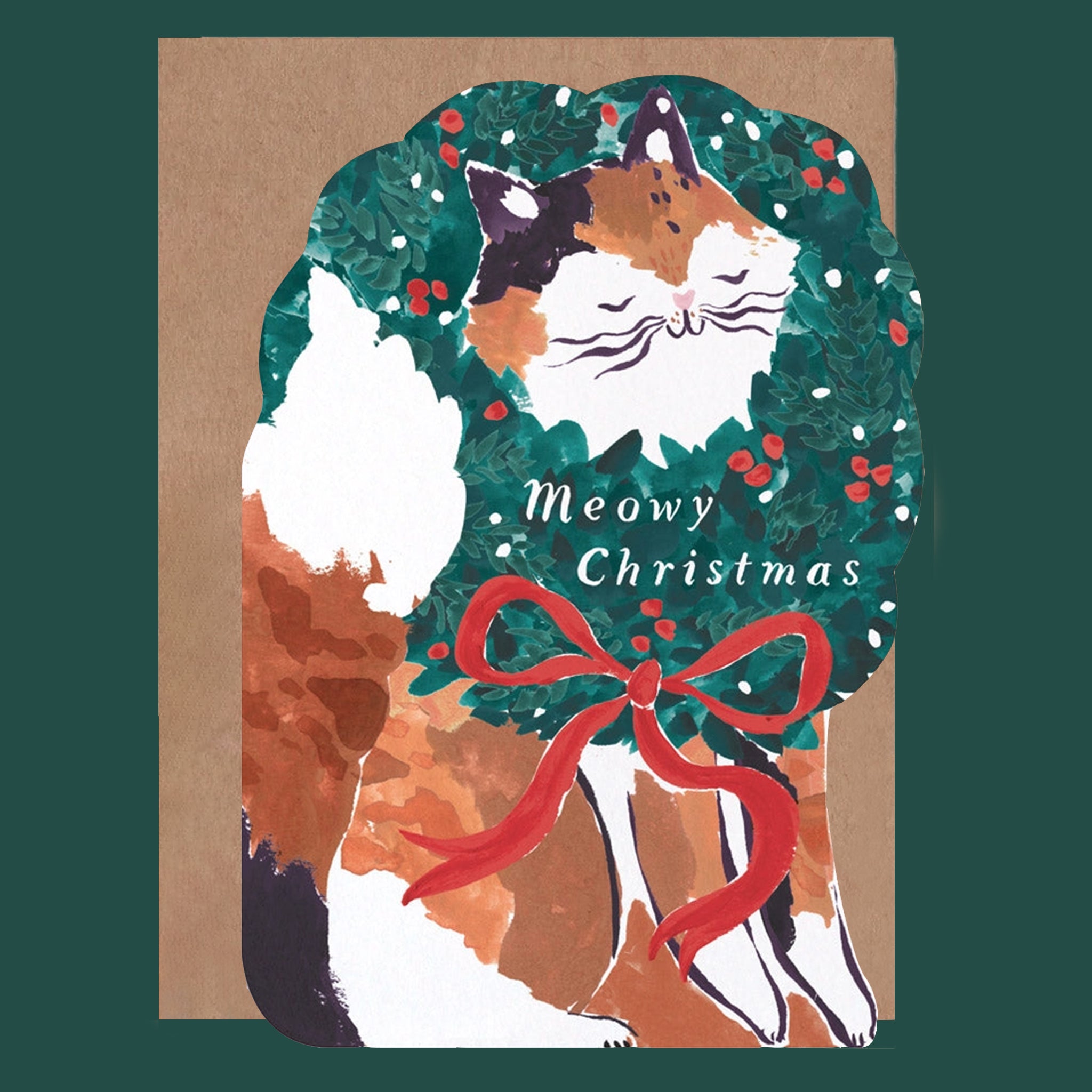 Greeting card in the shape of a cat. The cat has a wreath with a red bow around its neck. The card reads "Merry Christmas".