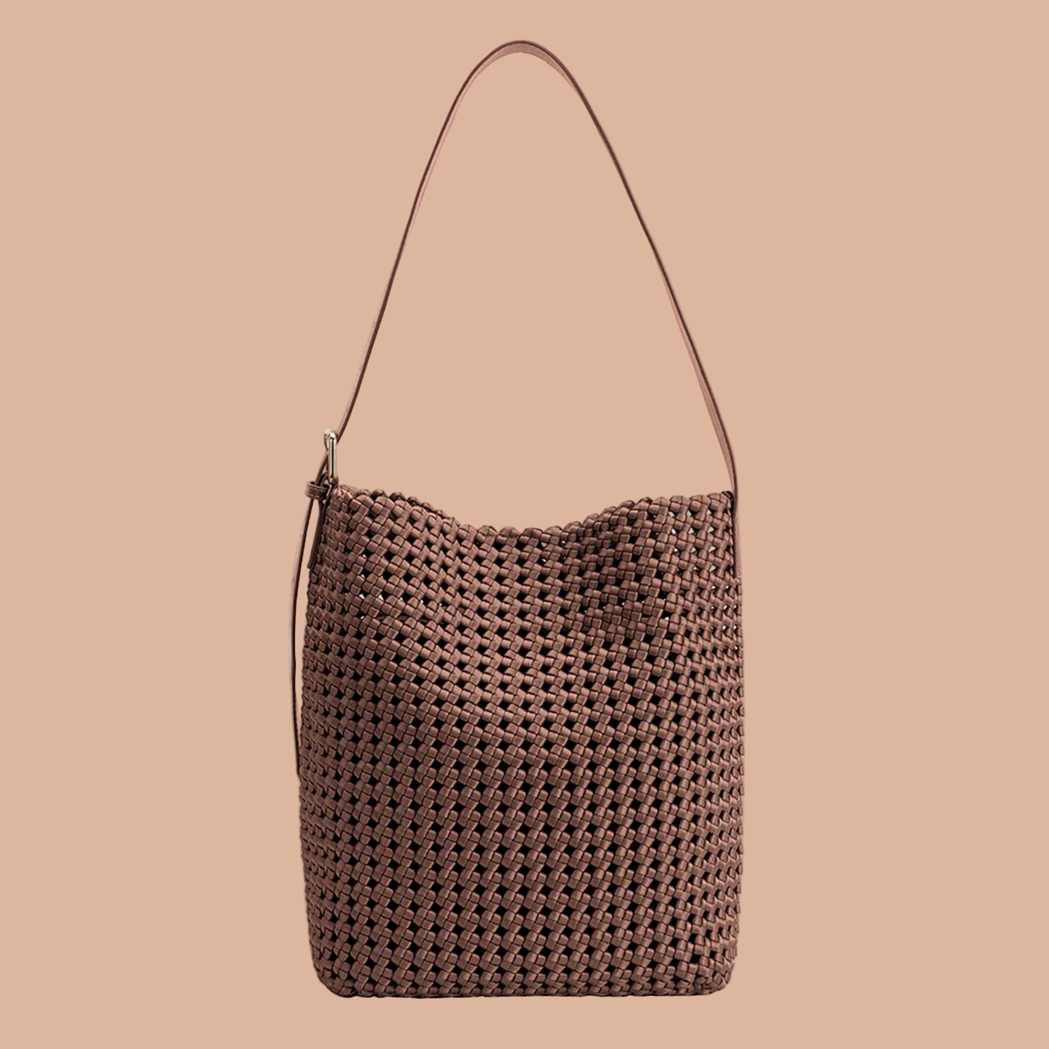 A brown shoulder bag with a woven detail. 