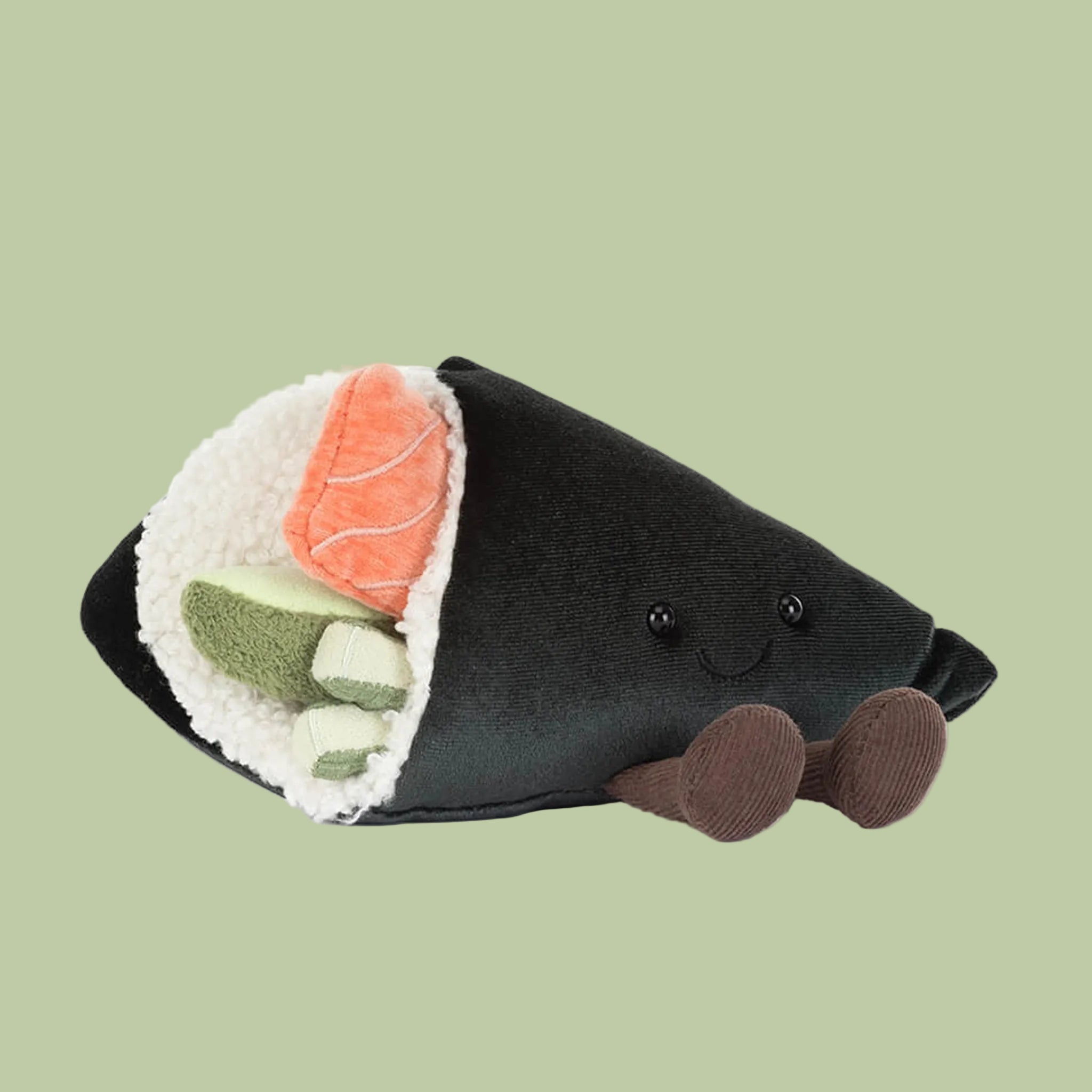 Stuffed toy resembling a piece of sushi on a white background