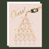 A celebration card! With Gold foil accents, this card features a champagne tower flowing with bubbly accented with gold foil. A hand is pouring champagne from the top, where it cascades all the way down. In gold foil cursive is written, "Cheers!". All of this is featured on a light pink background.