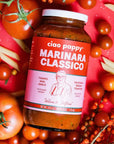 A glass jar of marinara with text that reads, 'ciao pappy Marinara Classico'. 
