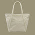 A super light green nylon tote bag.