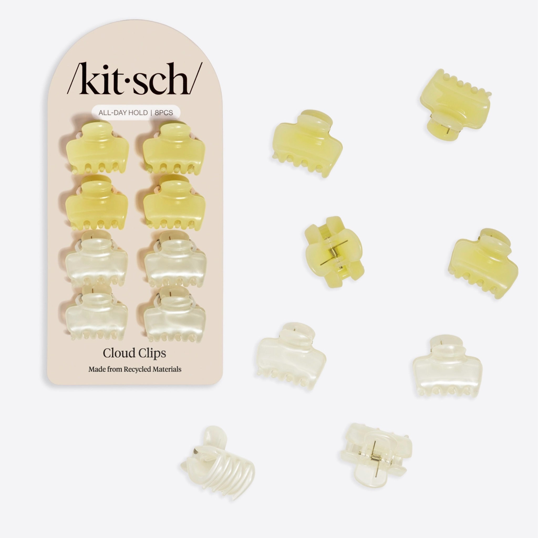 A set of yellow and neutral puffy small hair clips. "Kitsch All Day Hold 8PCS Cloud Clips Made From Recycled Materials".