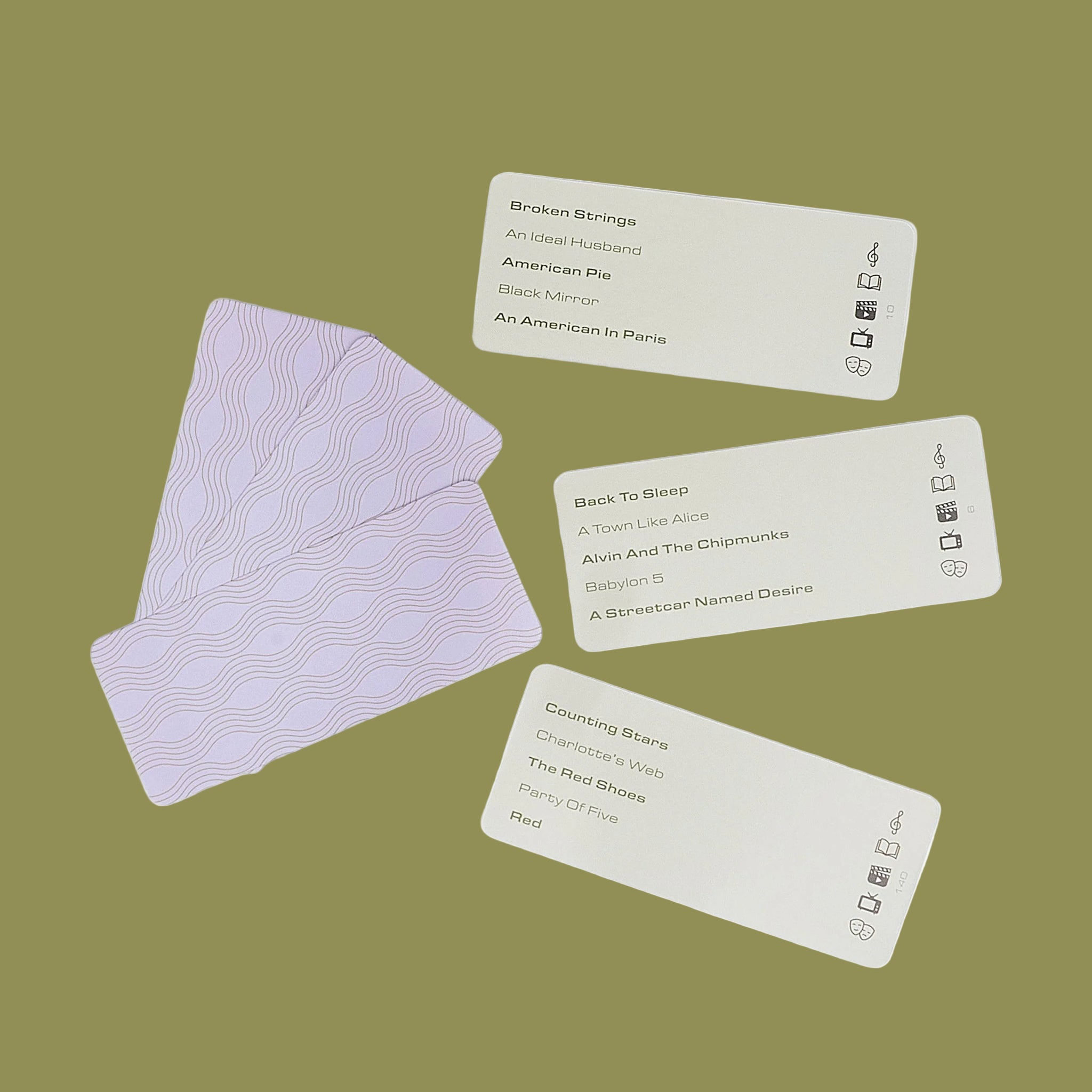 A box of cocktail hour charades with a graphic of a martini. 