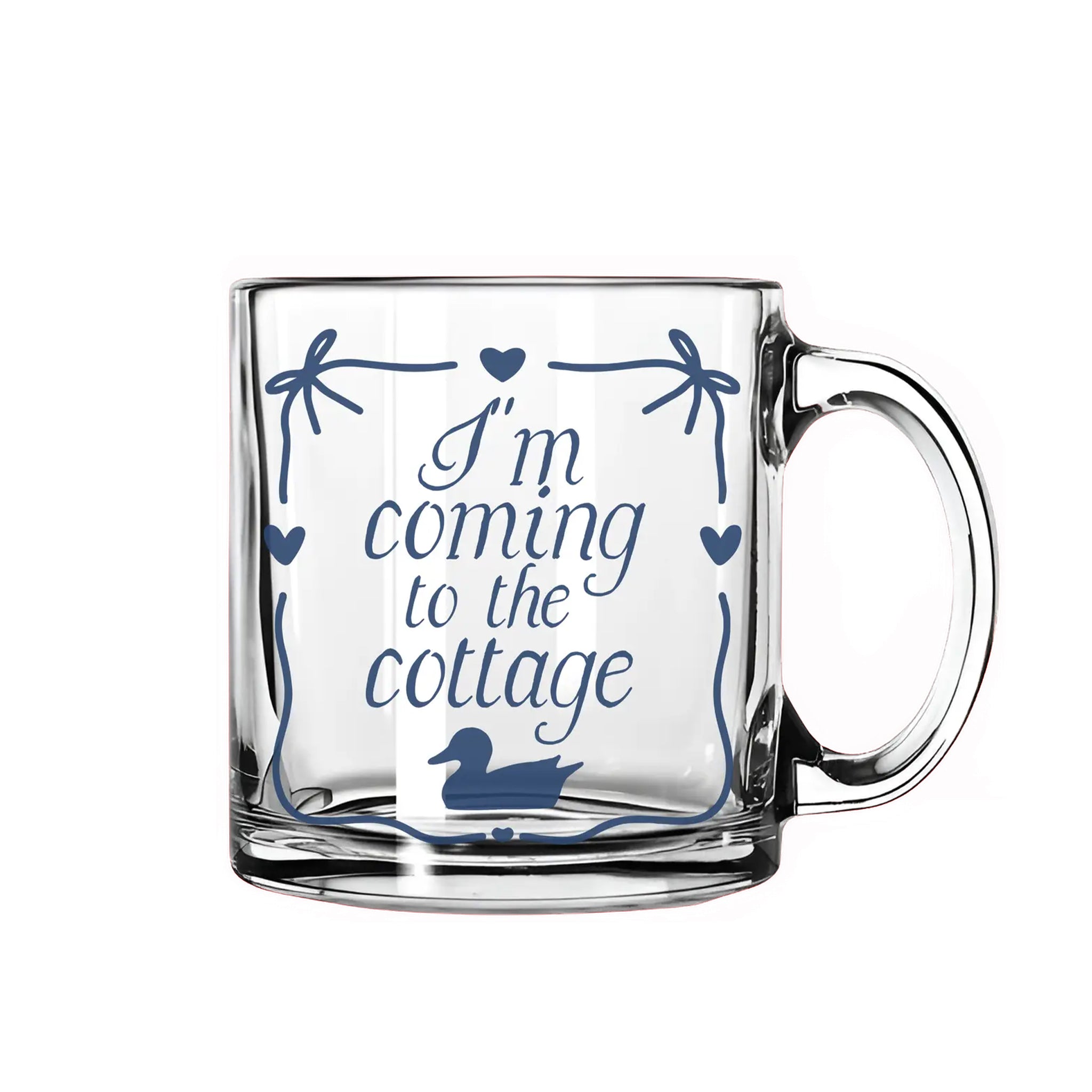 Clear glass mug with blue text and graphics on a white background