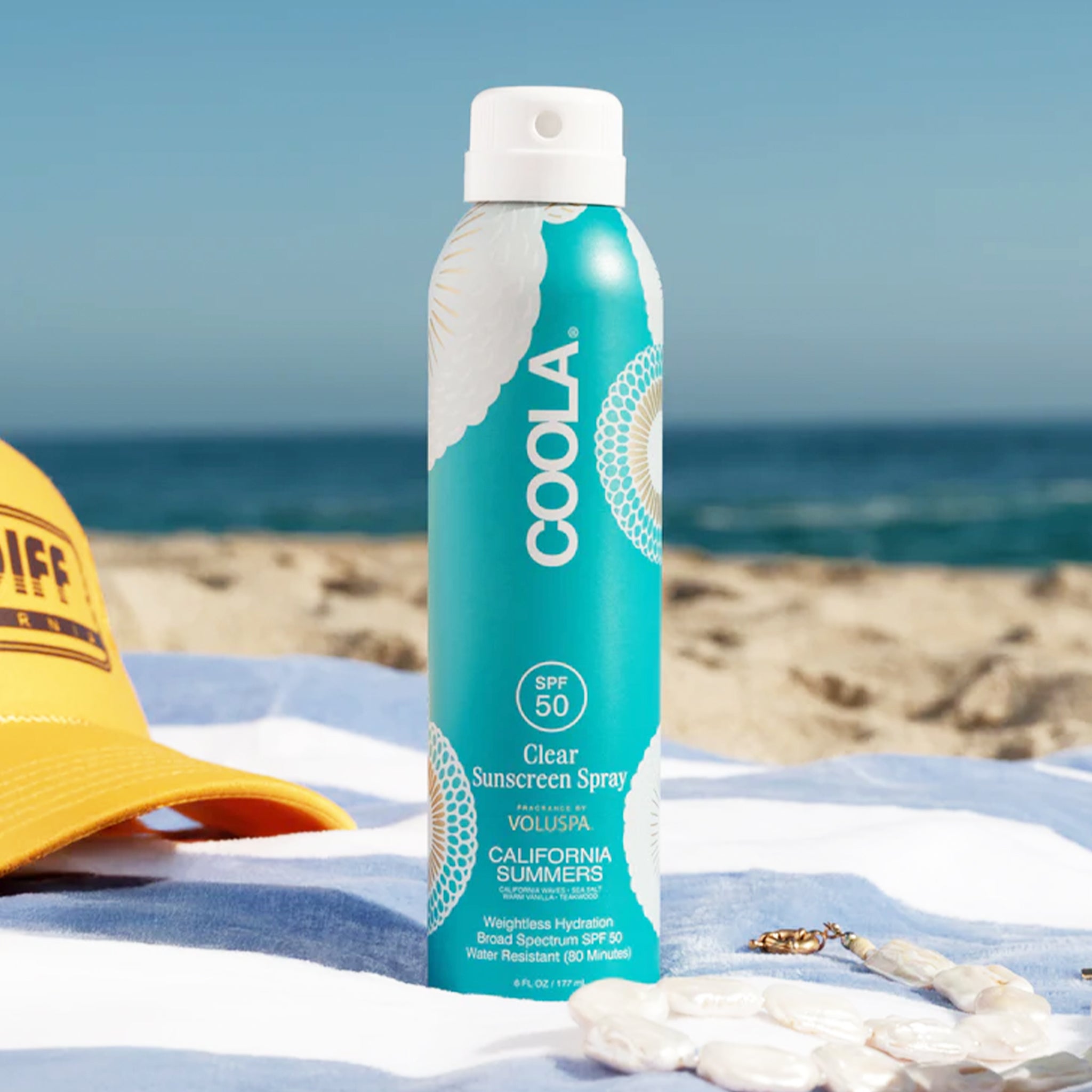"Coola SPF 50 Clear Sunscreen Spray Voluspa California Summers".