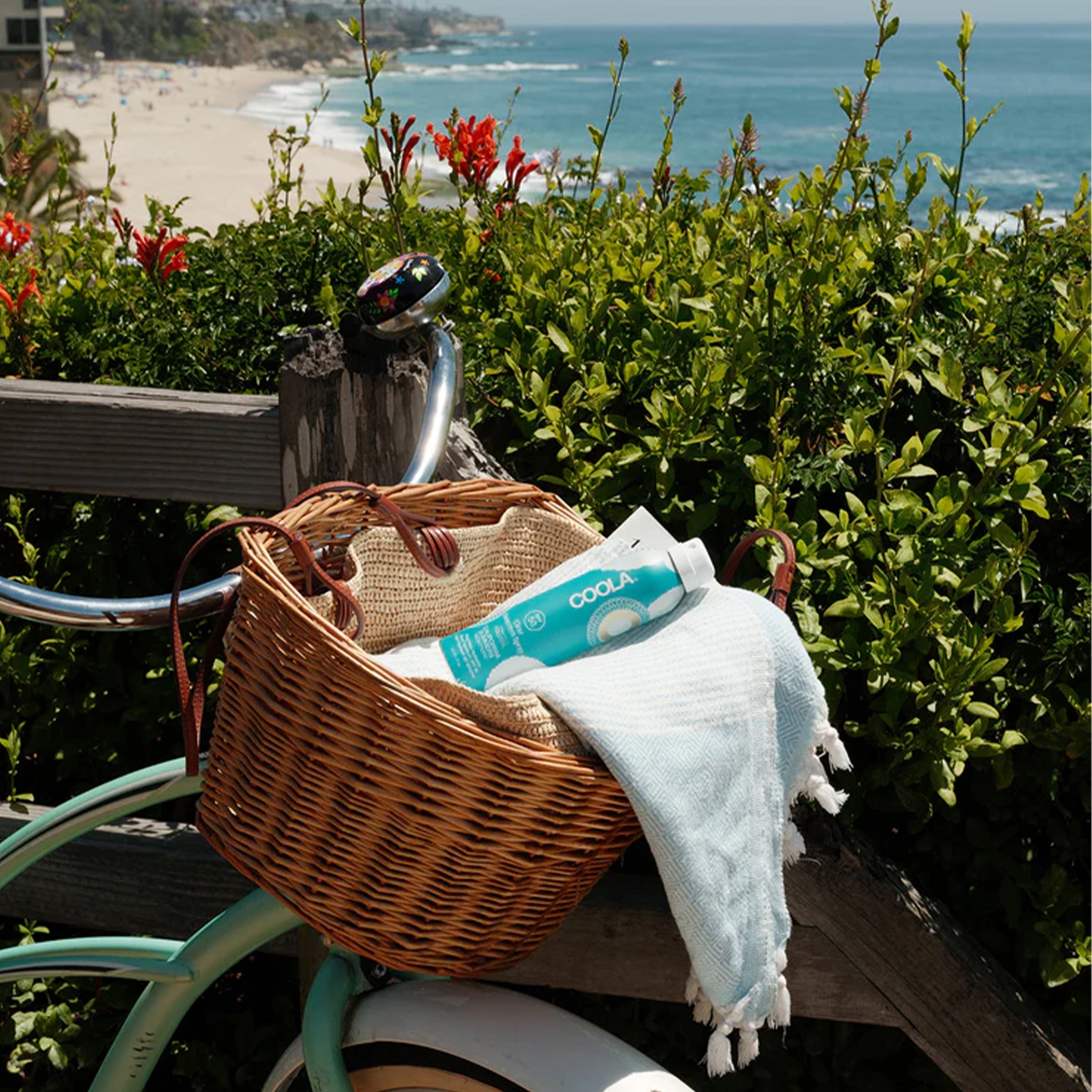 "Coola SPF 50 Clear Sunscreen Spray Voluspa California Summers".