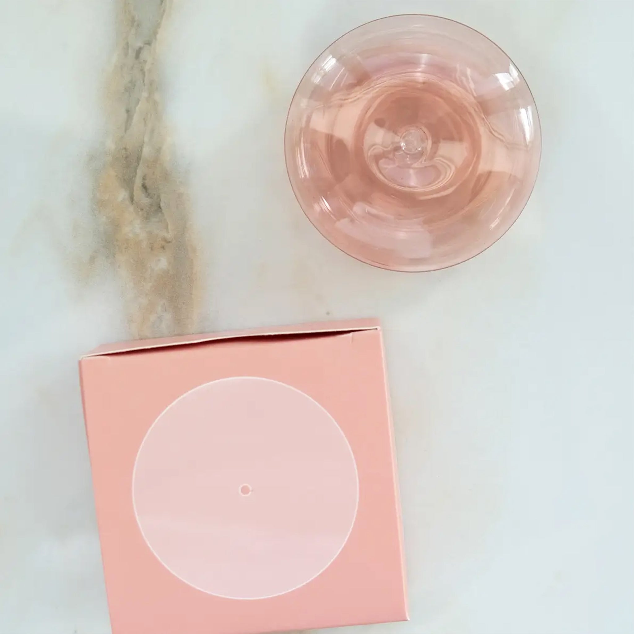 A coral pink bubble shaped incense holder. Incense not included. 