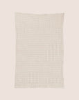 A waffle weave tea towel. 