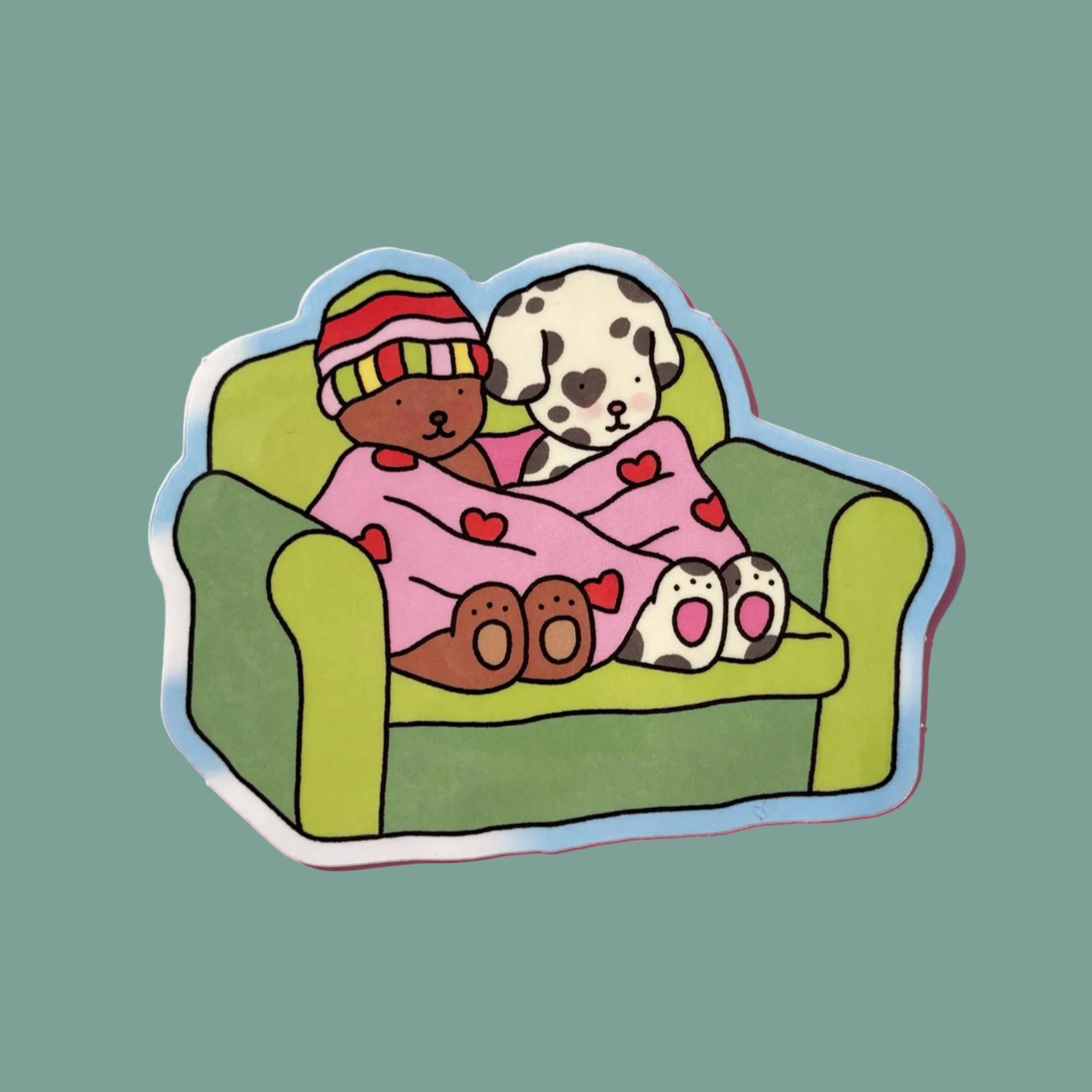 A sticker with two bobbie goods character cuddled on a couch. 
