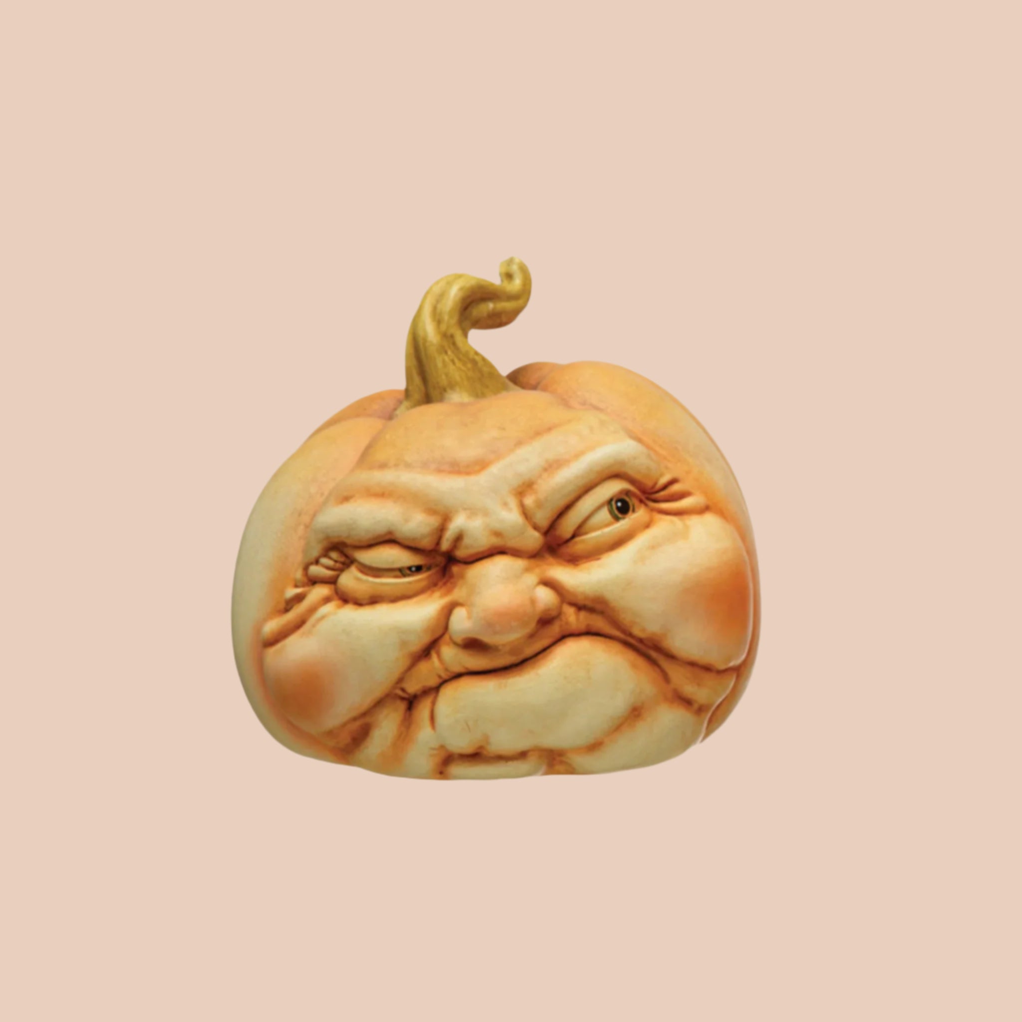 A pumpkin shaped decor piece with a cranky disposition on its face.