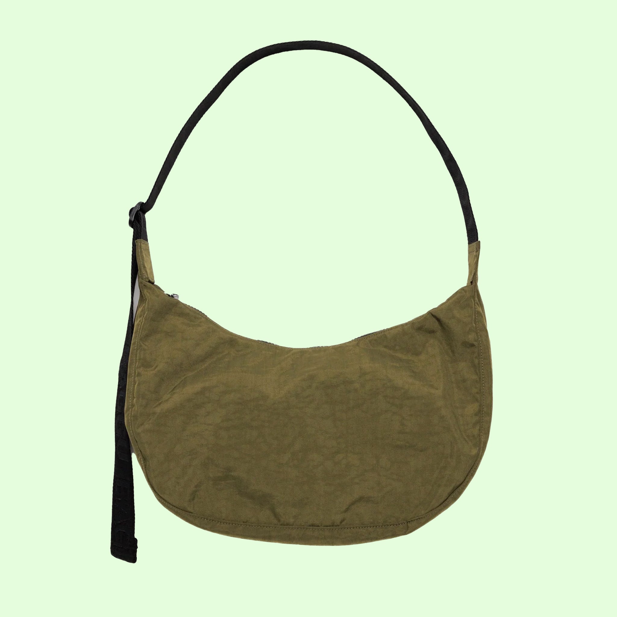 A dark green crescent nylon bag with a black shoulder strap. 