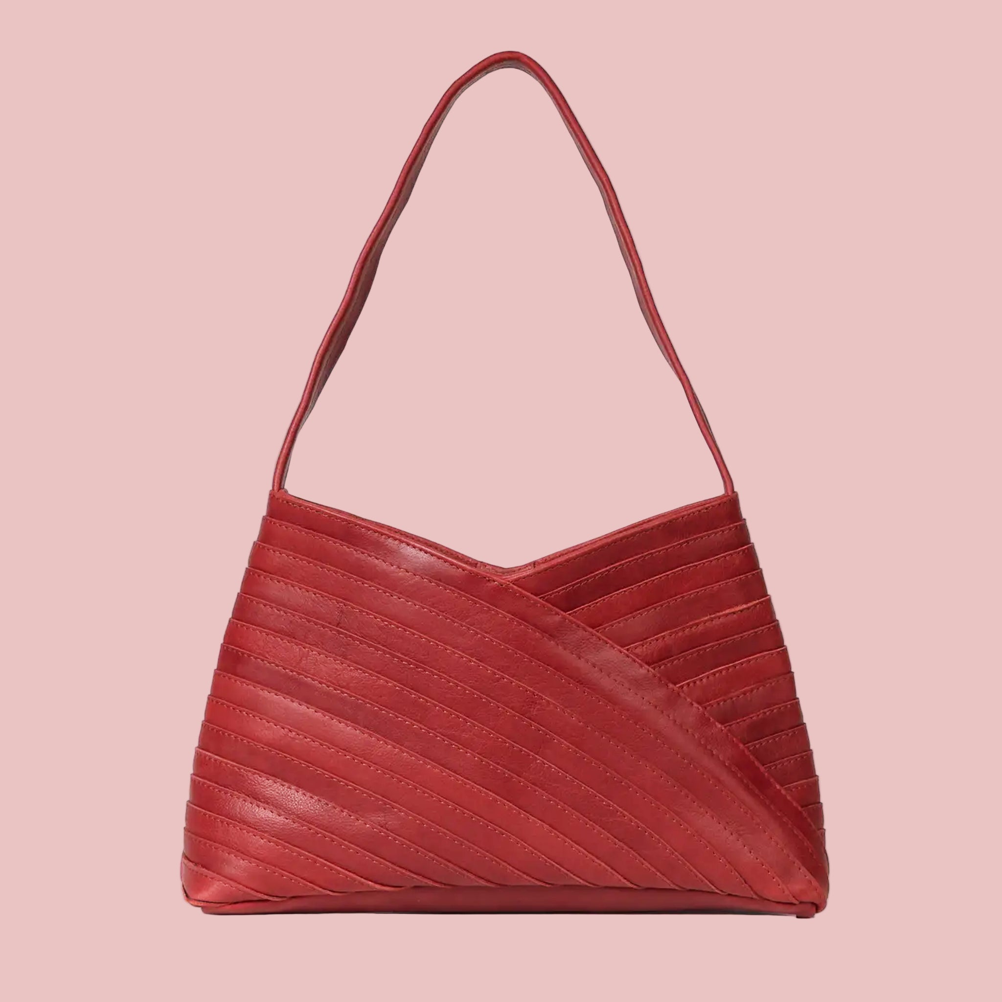 A red woven handbag. 