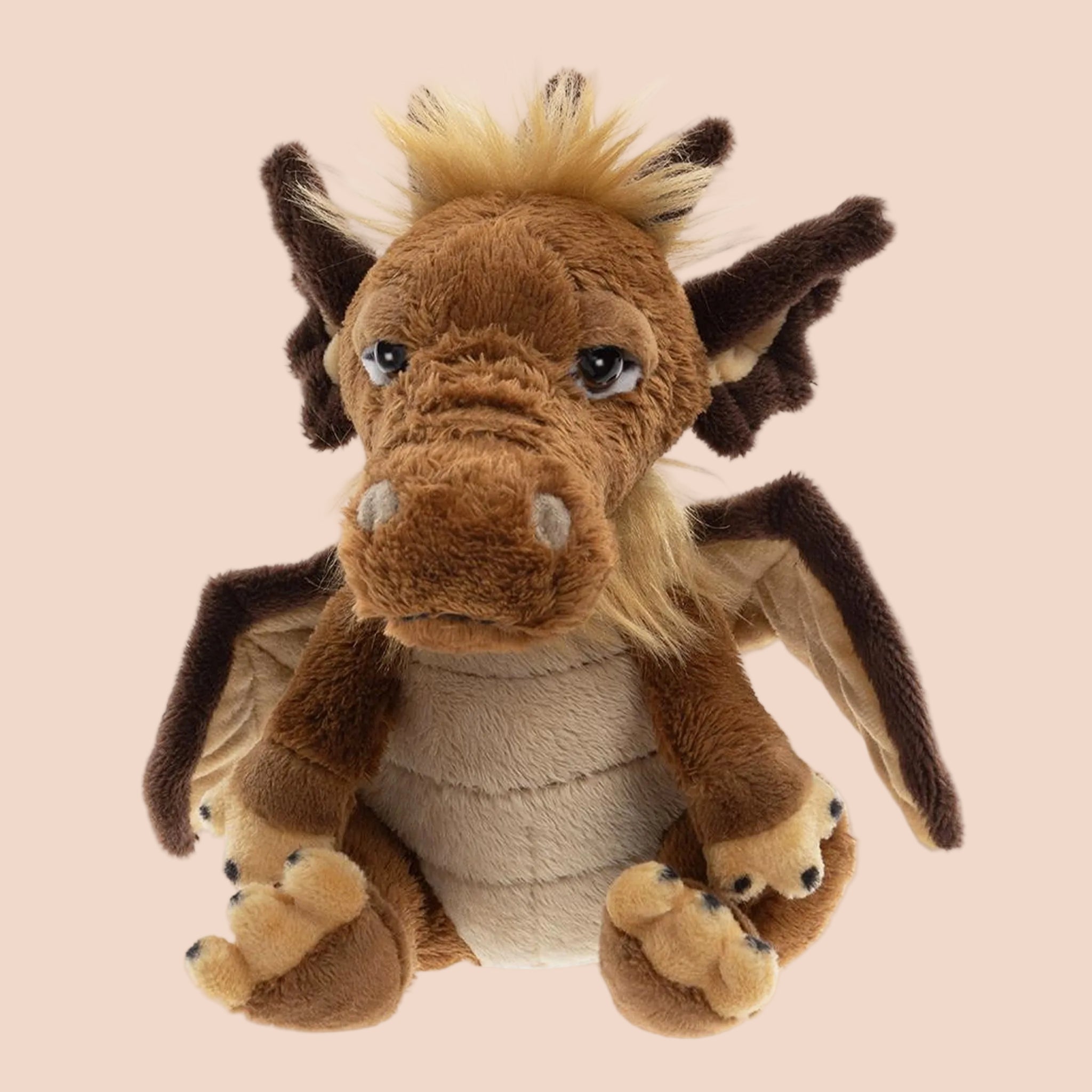 A mythical creature shaped stuffed animal toy. 