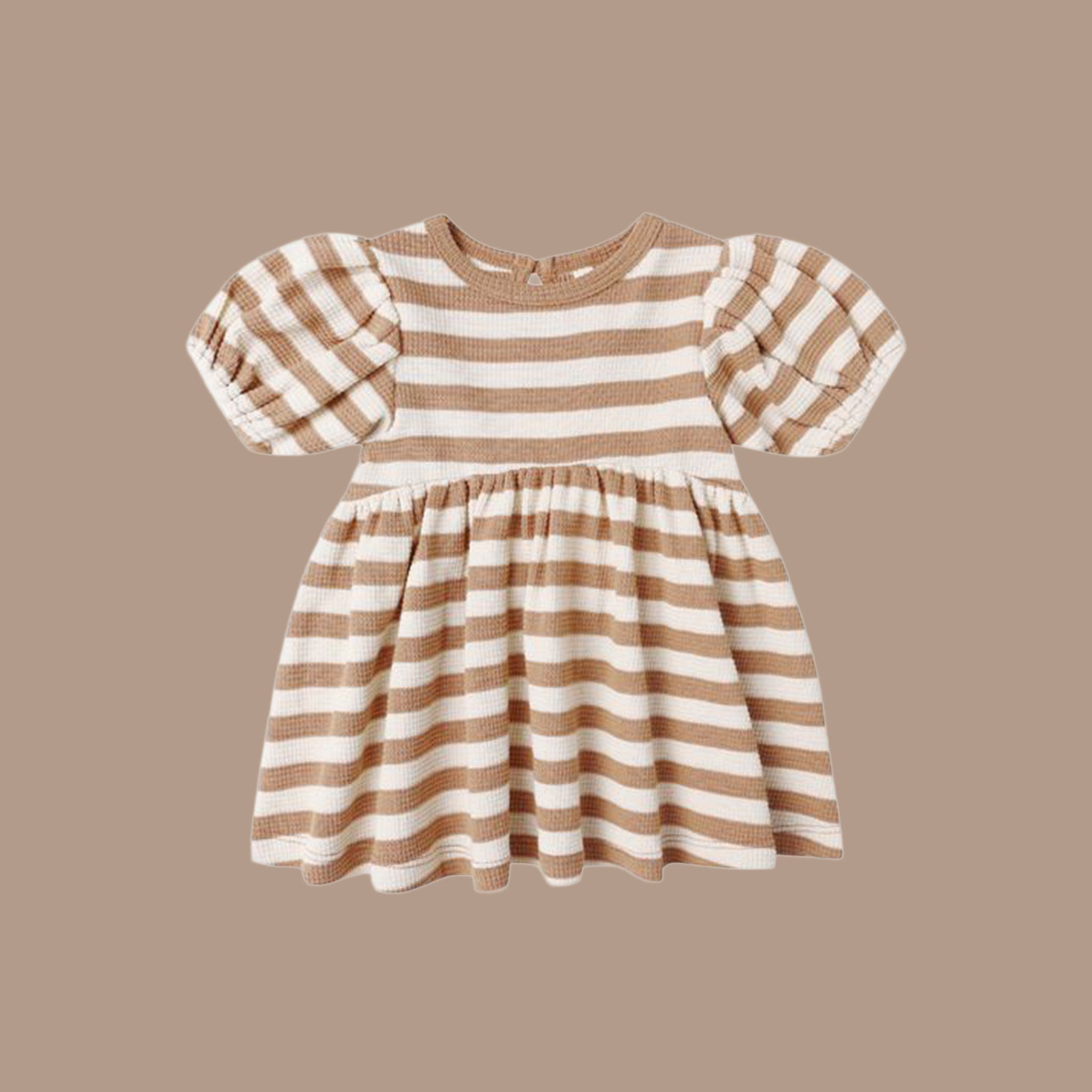 Waffle knit kids dress. The dress has bubble sleeves and a brown/off white stripe pattern. 
