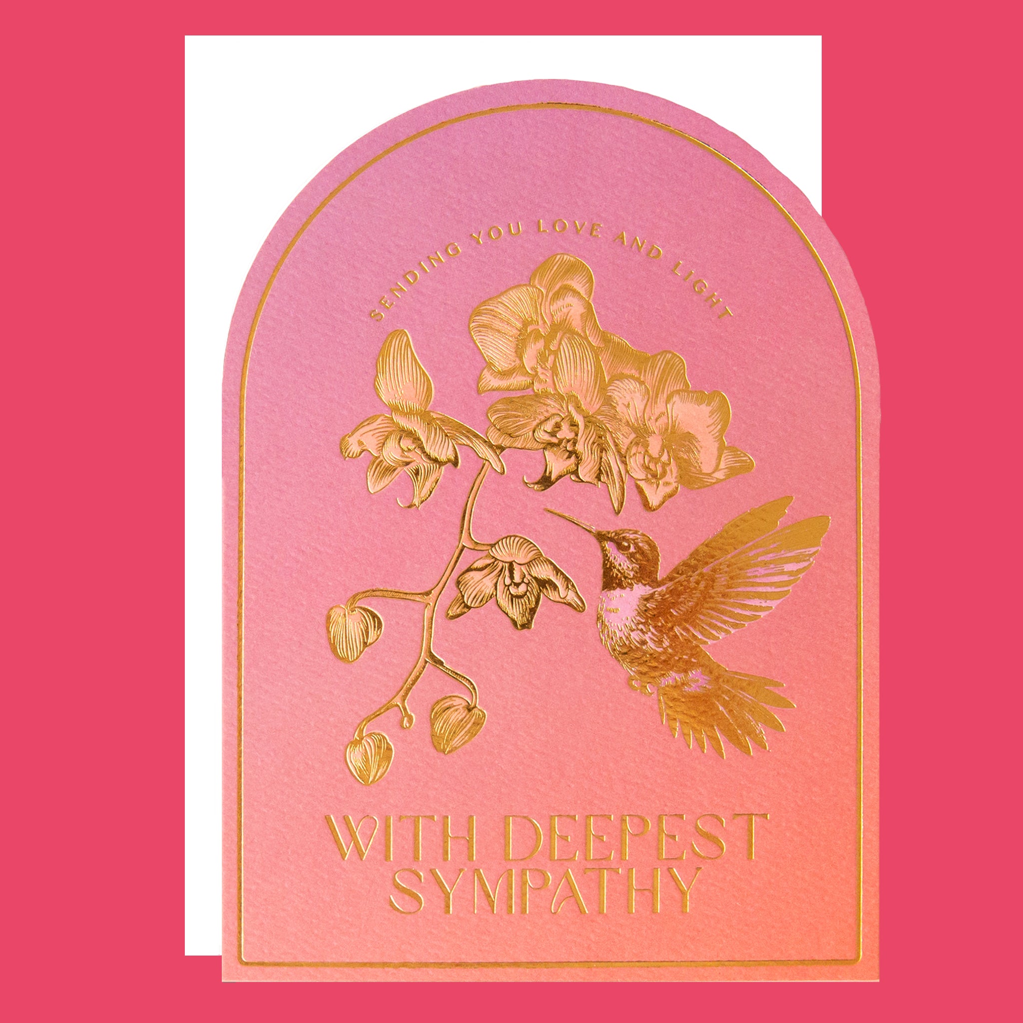 Sympathy card with gold hummingbird and floral design on a pink background