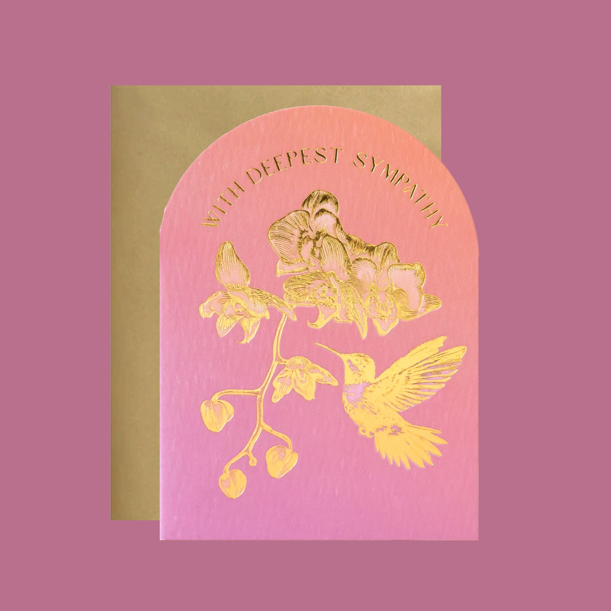 Greeting card with gold floral and hummingbird design on a pink background