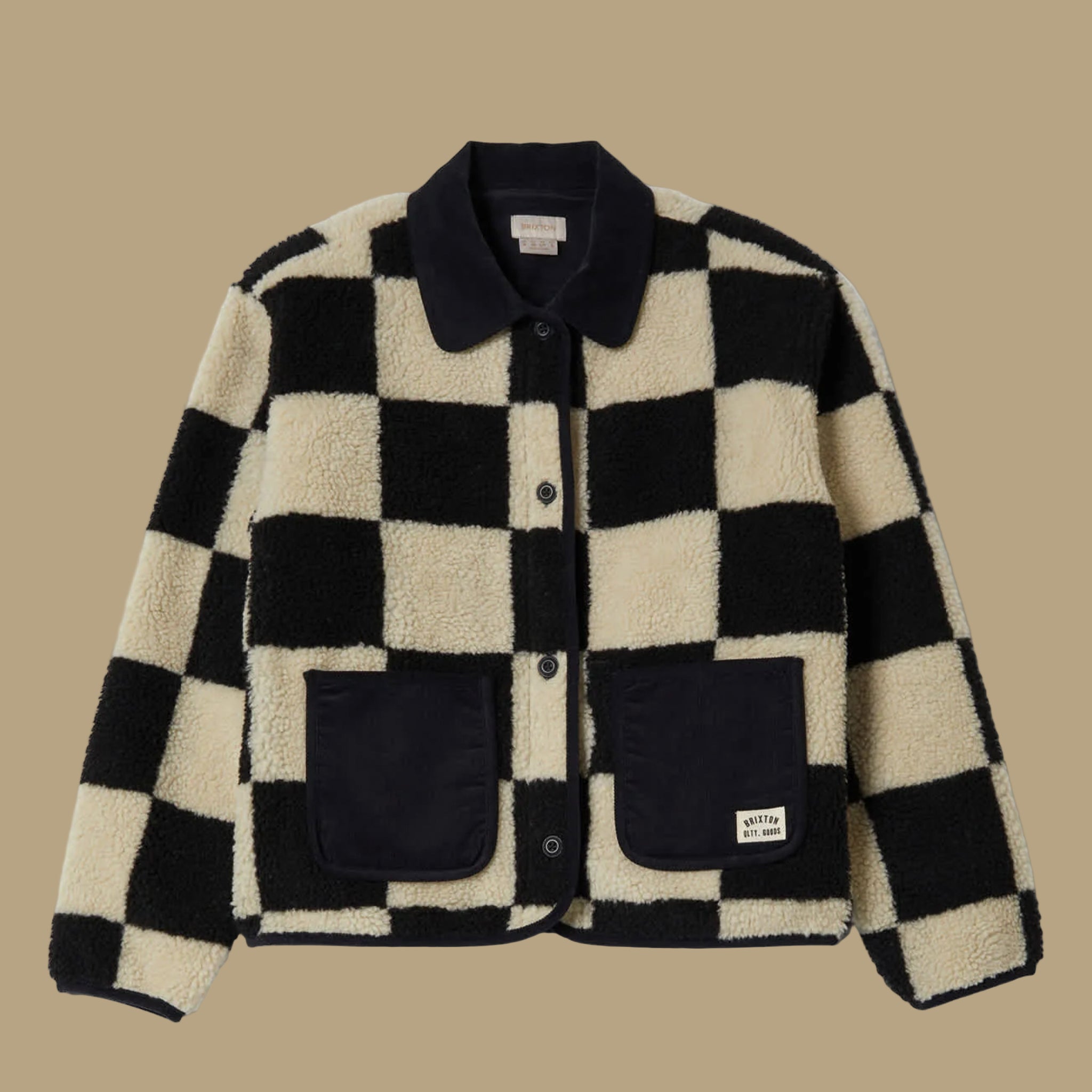 A black and cream checkered sherpa jacket. 