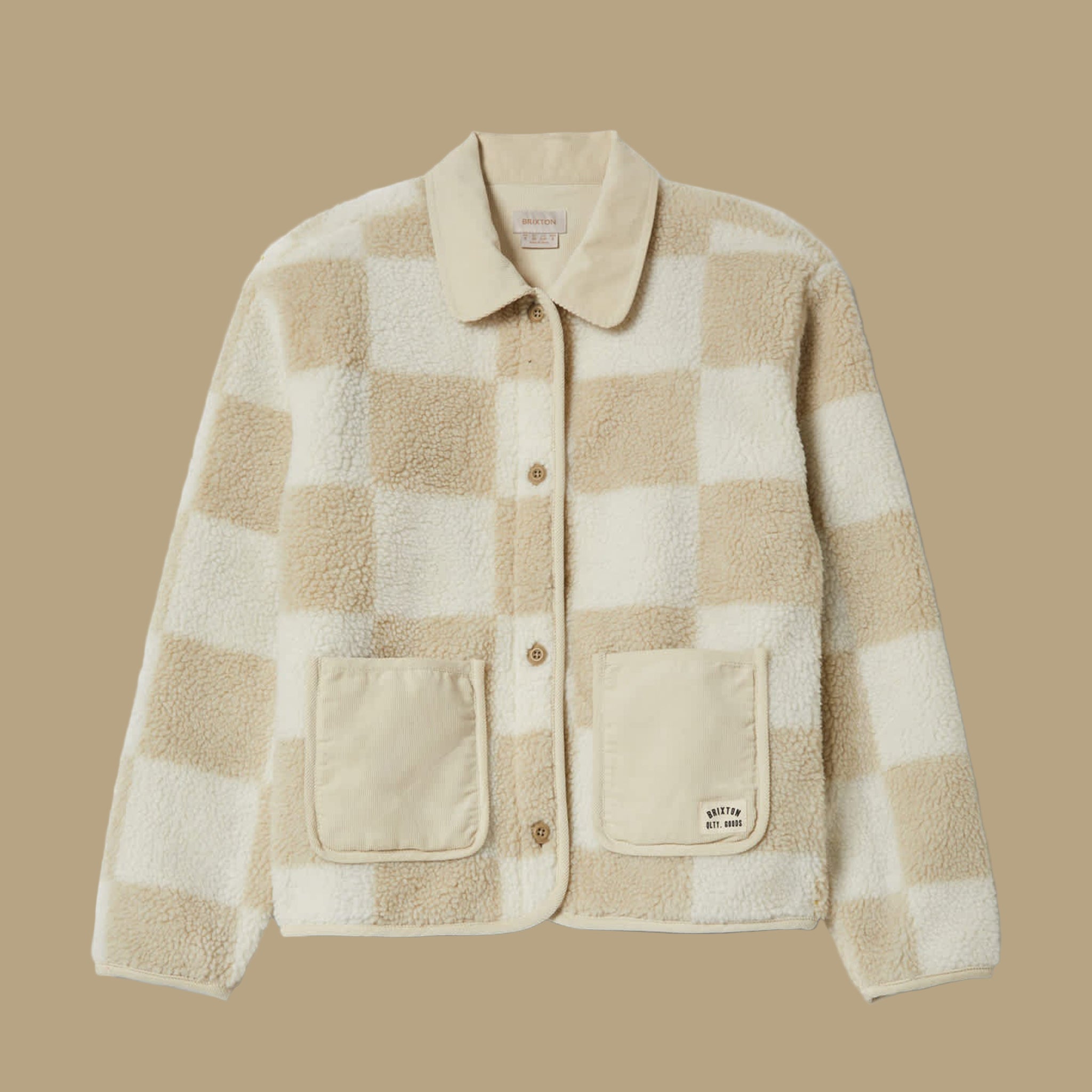 A white and tan checkered sherpa jacket. 
