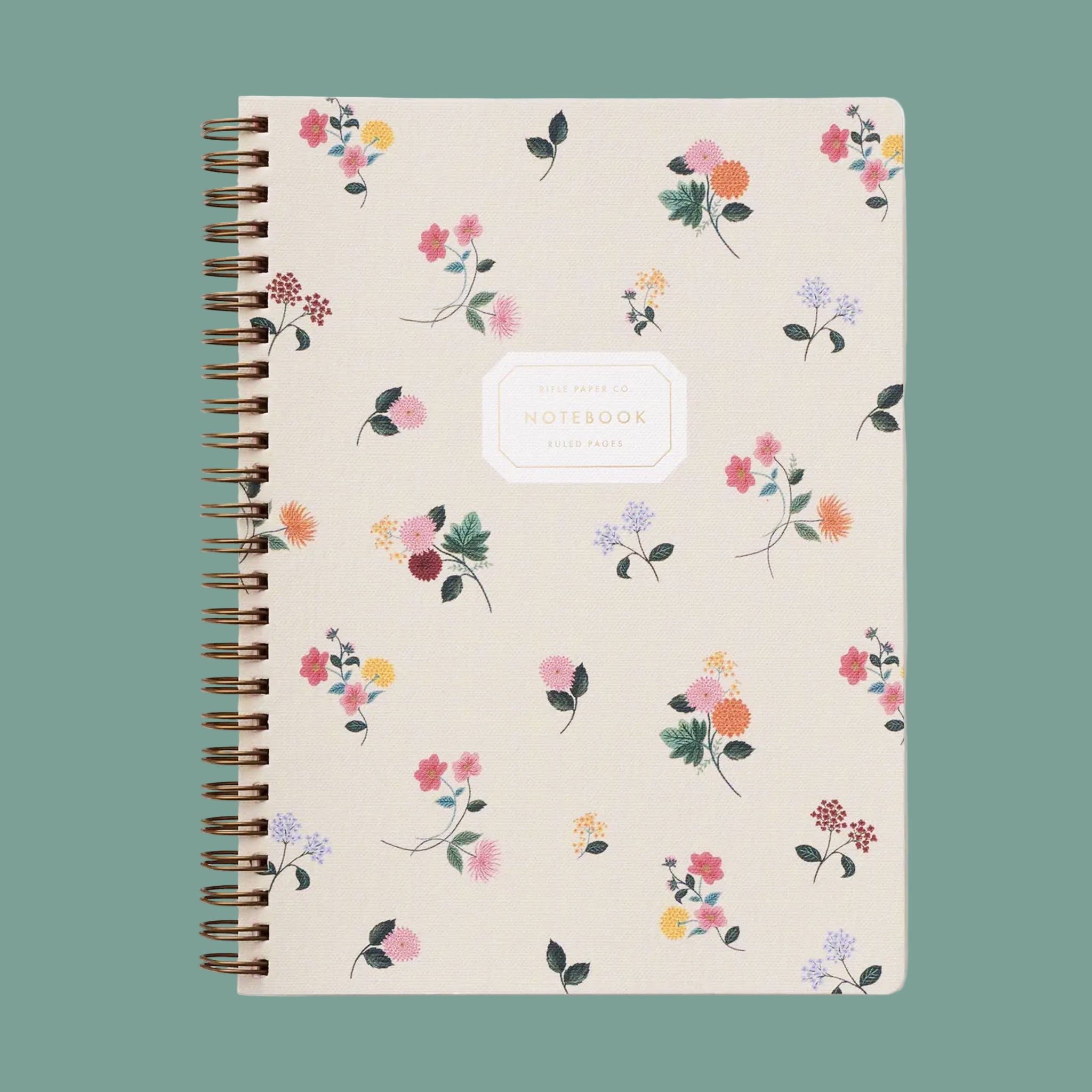 "Notebook Ruled Pages". A floral spiral bound notebook. 