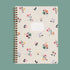 "Notebook Ruled Pages". A floral spiral bound notebook. 