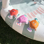 A set of three waterproof fruit shaped water toys. 