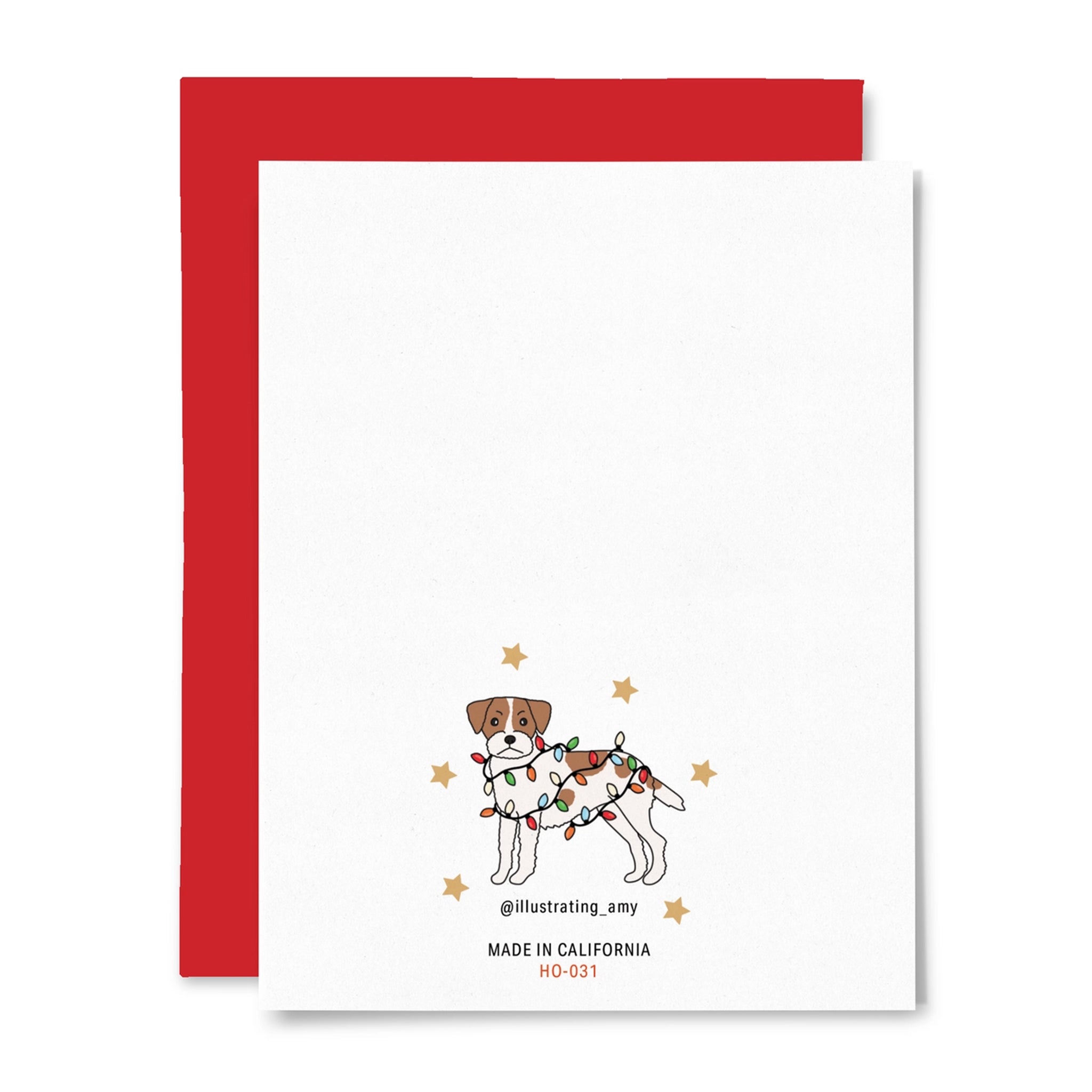 A white card with a variety of dog illustrations dress in festive accessories and text at the top that reads, 'Happy Holidays'.