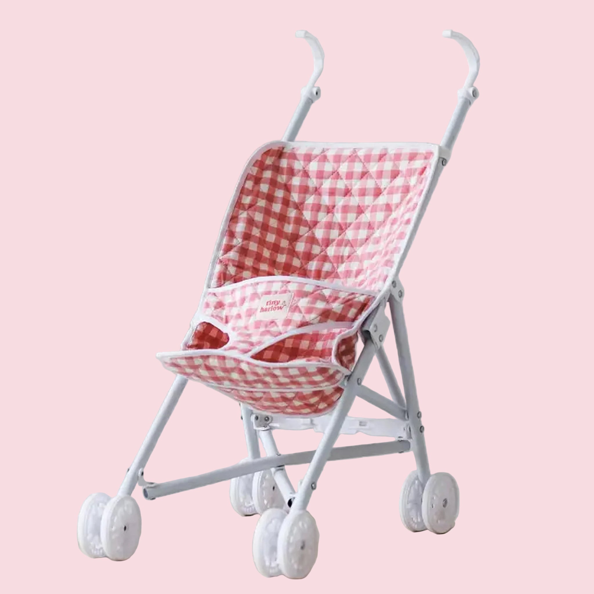 A pink and cream gingham print doll troller. 