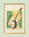 An art print of Dolly Parton signing and holding her banjo with a green background and her in pink. Frame not included. 