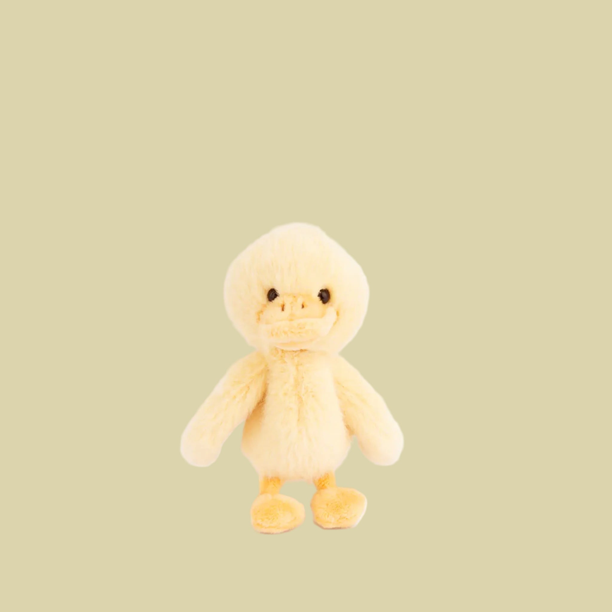 A white and yellow mama and baby duck stuffed animal.