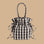 A black and cream drawstring bag.