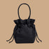 A black drawstring handbag.