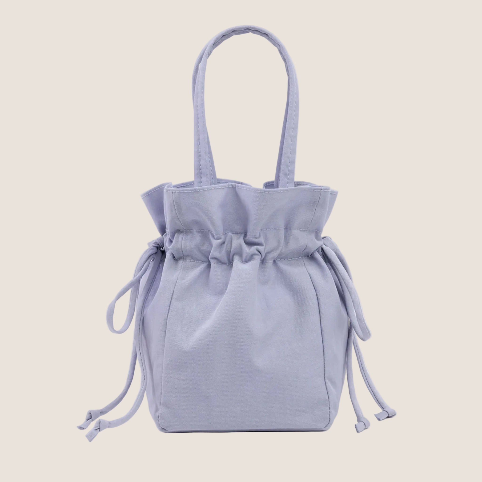 A light blueish / purple drawstring bag. 