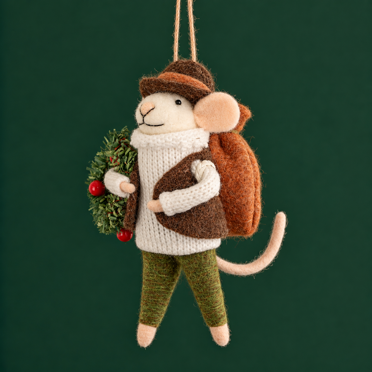 a mouse shaped ornament with a wreath. 