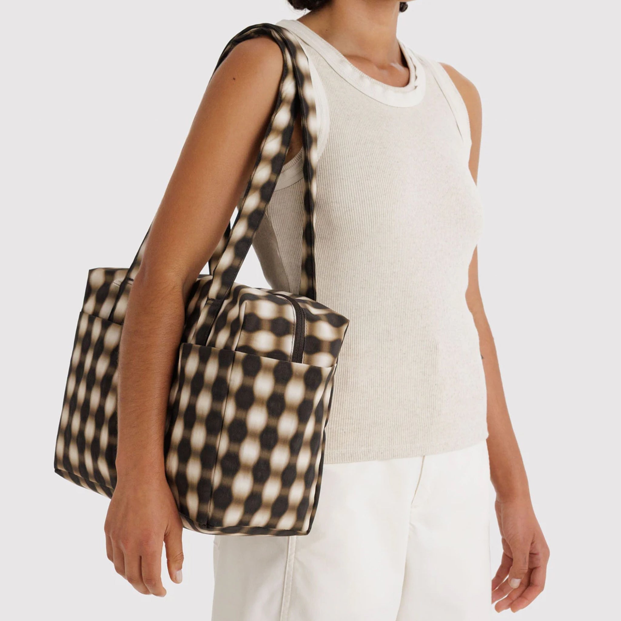 A brown, tan and black blurred gingham print. 