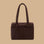 A coffee colored nylon tote bag.