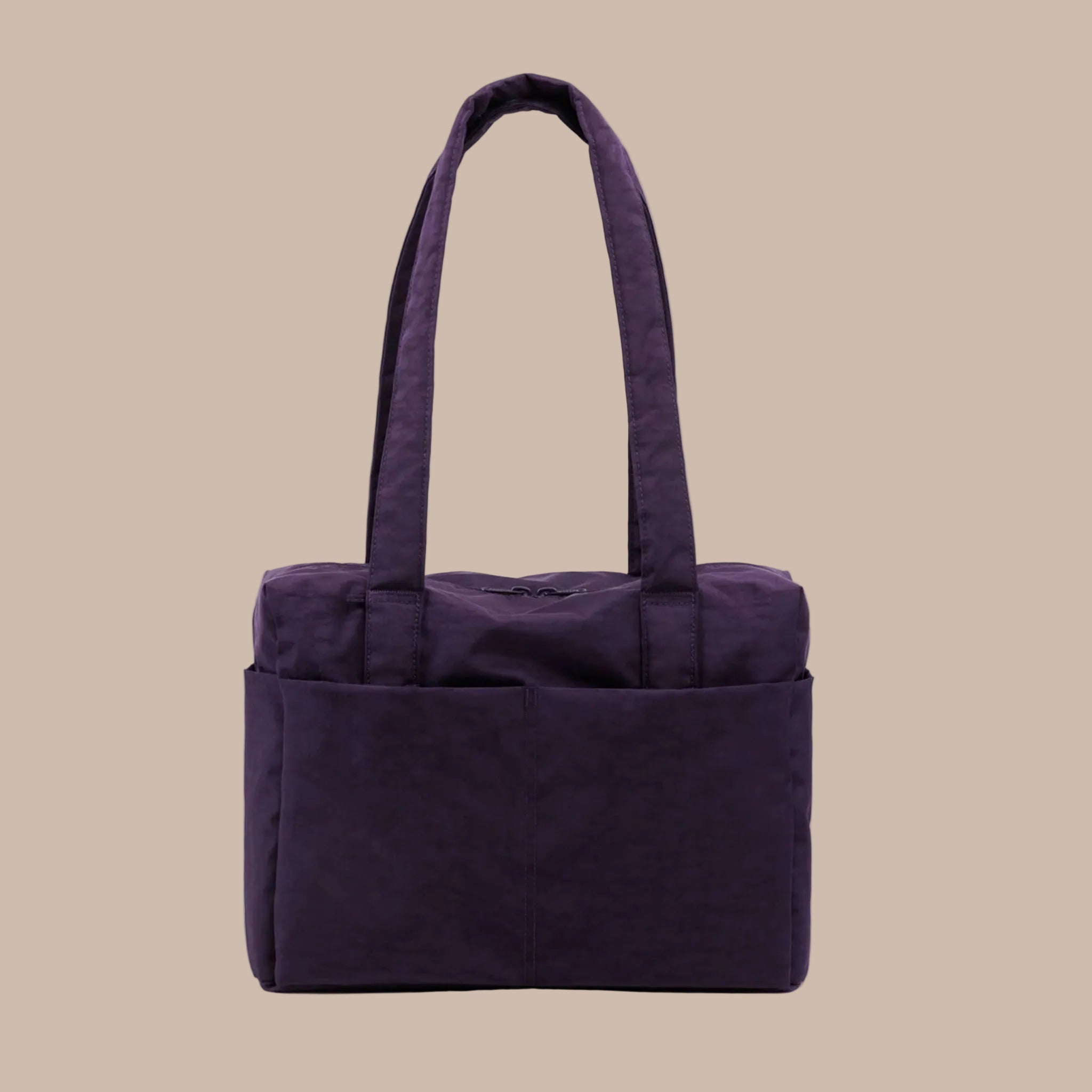 A dark purple nylon tote bag. 