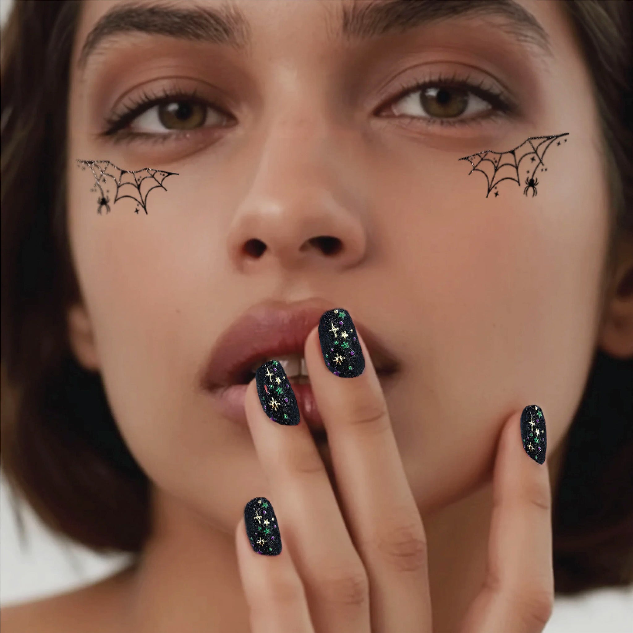 A model wearing the spider web eye patch speckles. 