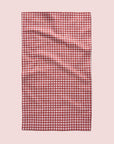 A red and ivory plaid print one sided kitchen towel. 