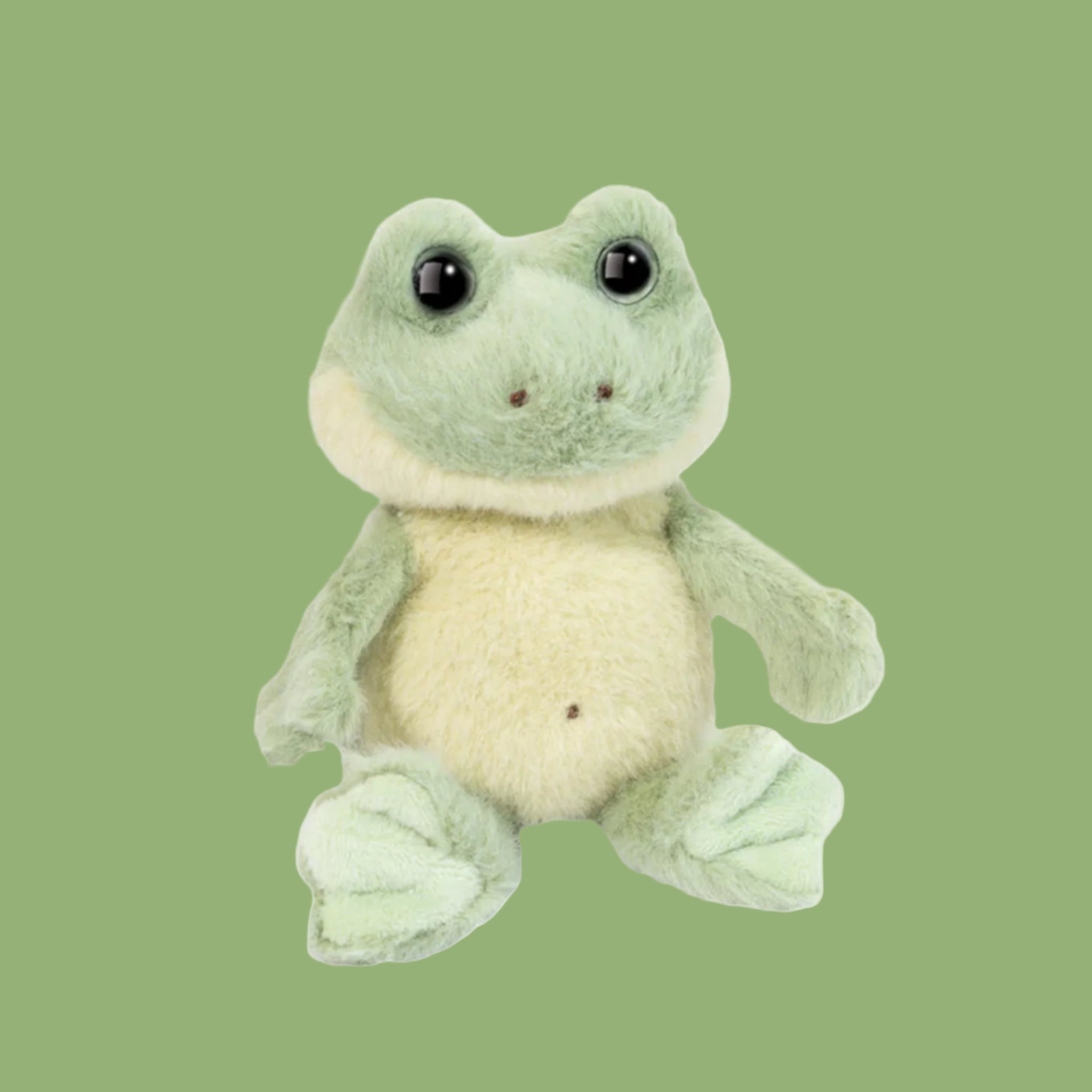 A fuzzy frog shaped stuffed animal. 