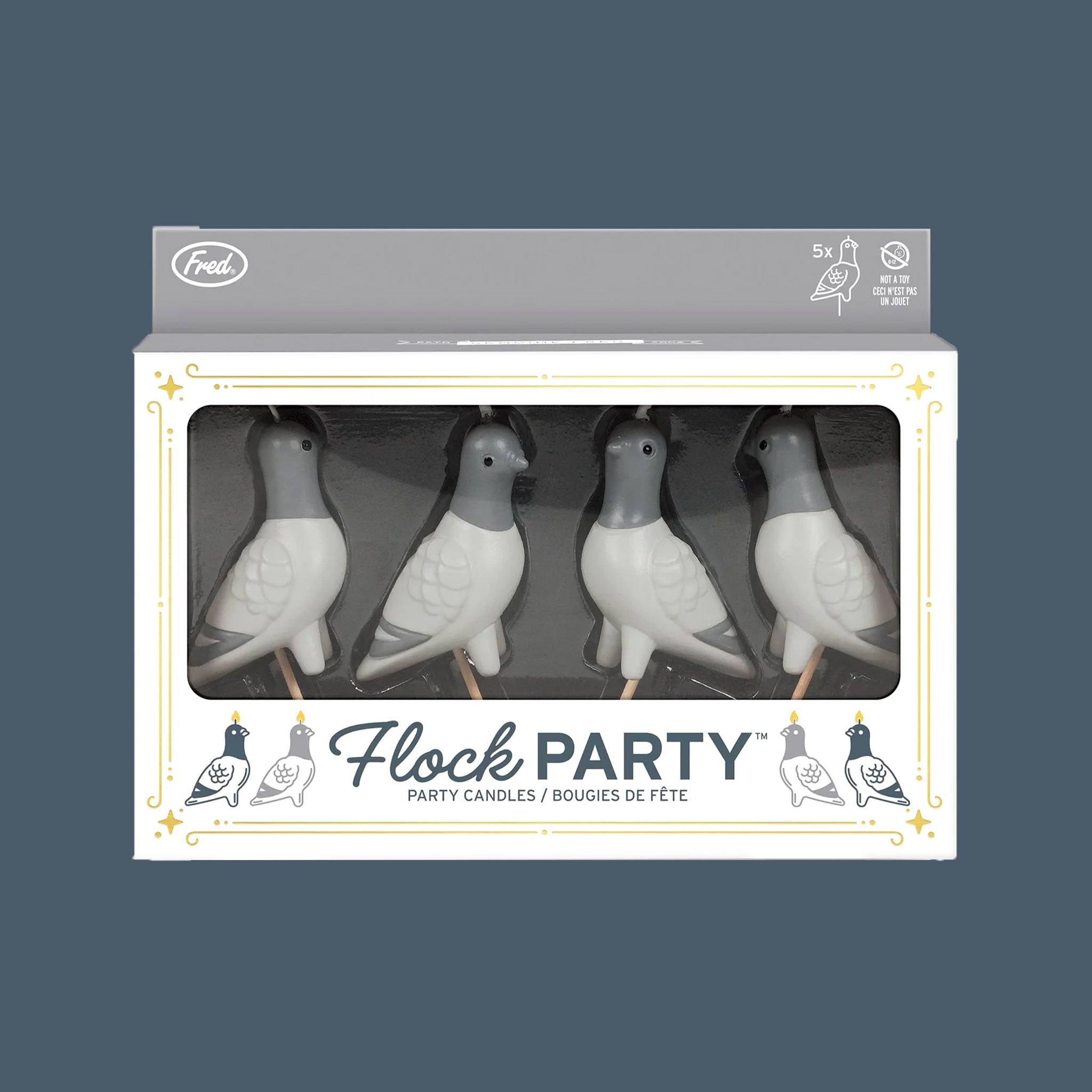 A set of four pigeon shaped candles. 
