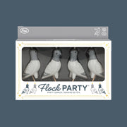 A set of four pigeon shaped candles. 