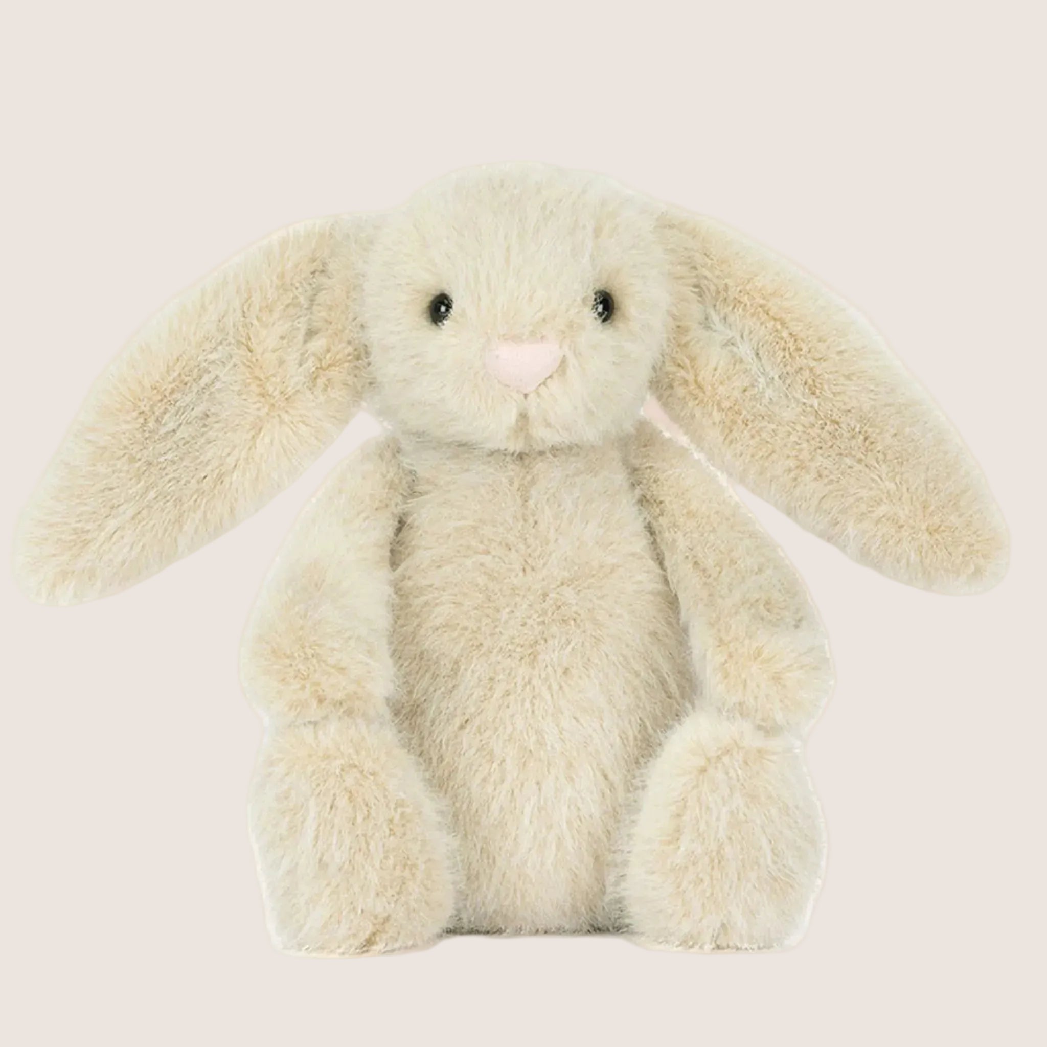 An ivory fluffy bunny stuffed animal.