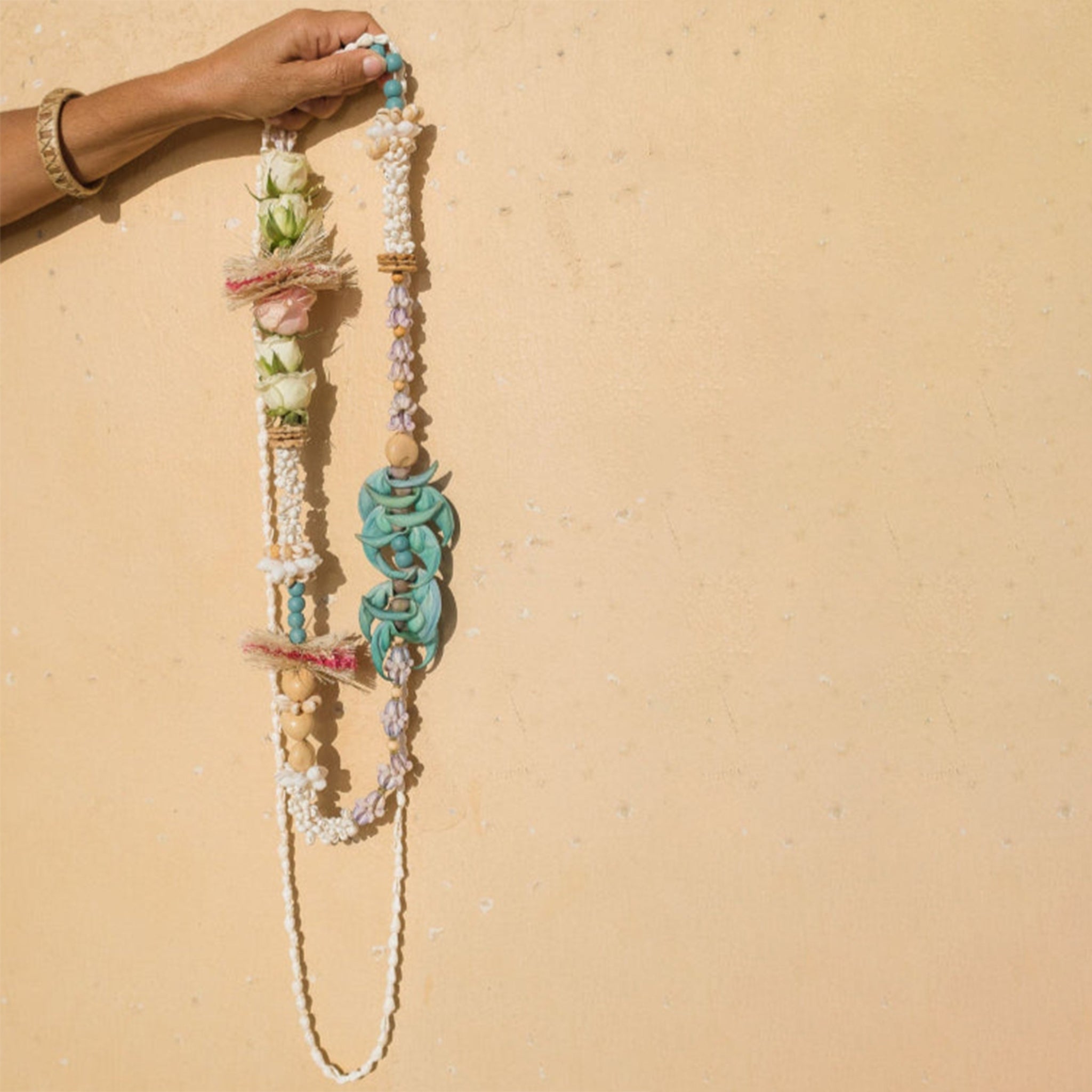 a 'forever' lei made of various shells