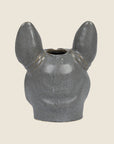 A french bulldog head shaped stoneware vase. 